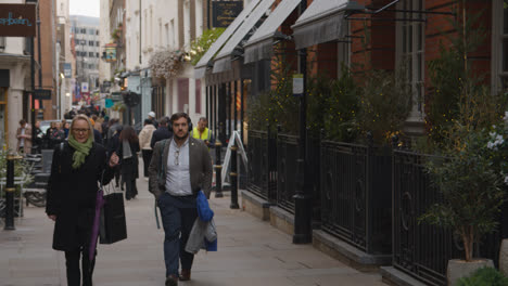 Shops-And-Restaurants-With-People-On-Avery-Row-In-Mayfair-London-UK